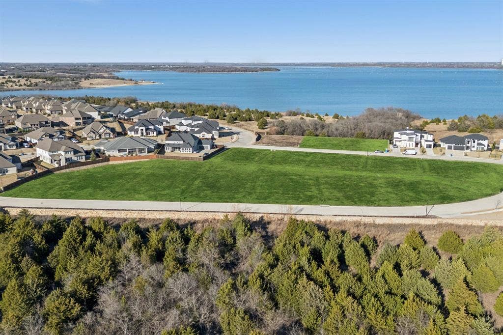2015 April Dew Way, Wylie, TX 75098 Scenic views of Lavon Lake and abundant amenities throughout the neighborhood