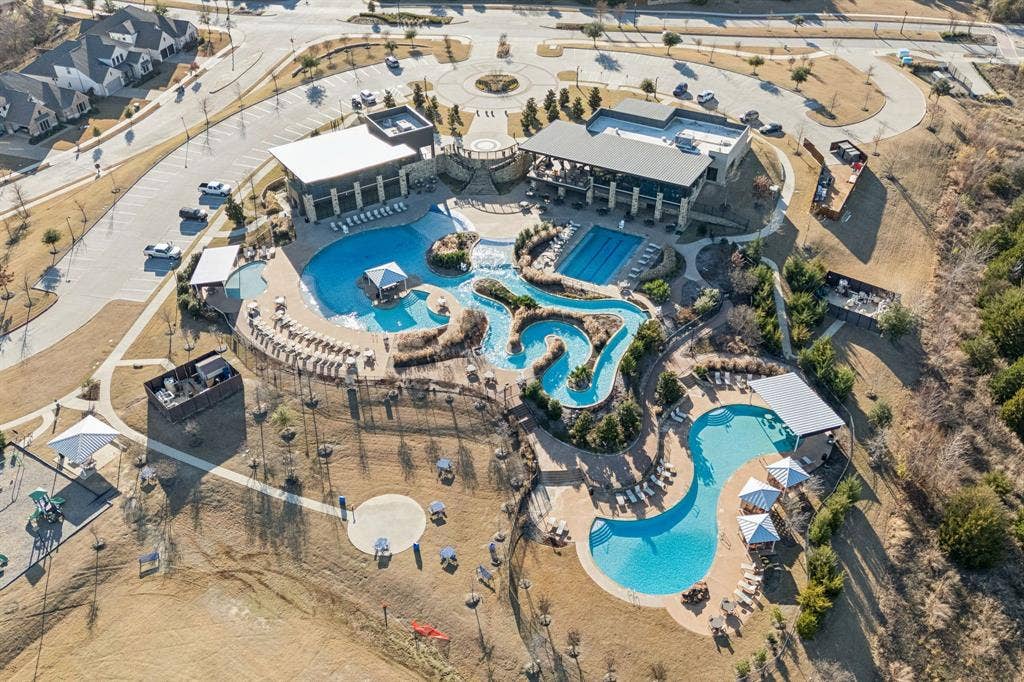 2015 April Dew Way, Wylie, TX 75098 Club Inspiration offers multiple pools, outdoor living spaces, games, gyms, and a banquet hall