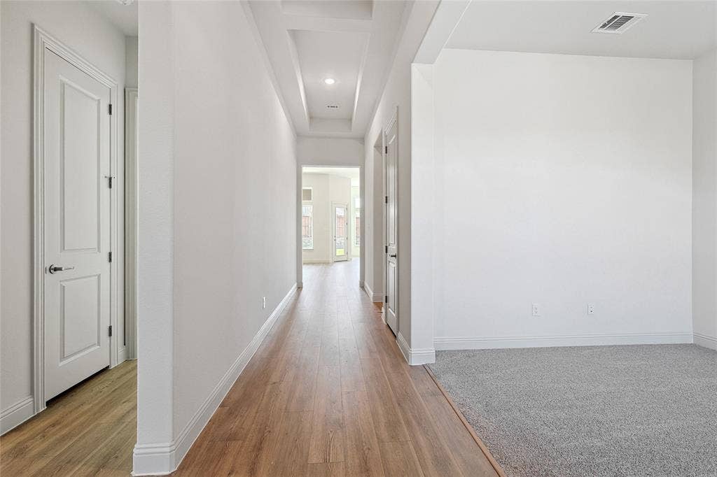 313 Trinity Court, Shady Shores, TX 76208 Hall featuring light wood finished floors and recessed lighting