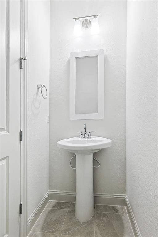 313 Trinity Court, Shady Shores, TX 76208 Bathroom featuring baseboards