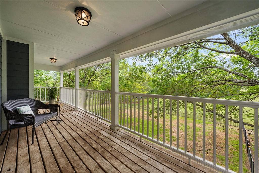 820 Windlake Circle, Heath, TX 75032 Upstairs balcony overlooking green space3