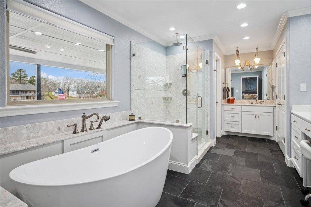 154 Bayside Circle, Malakoff, TX 75148 Primary bath with soaking tub, walk in shower and separate vanities.