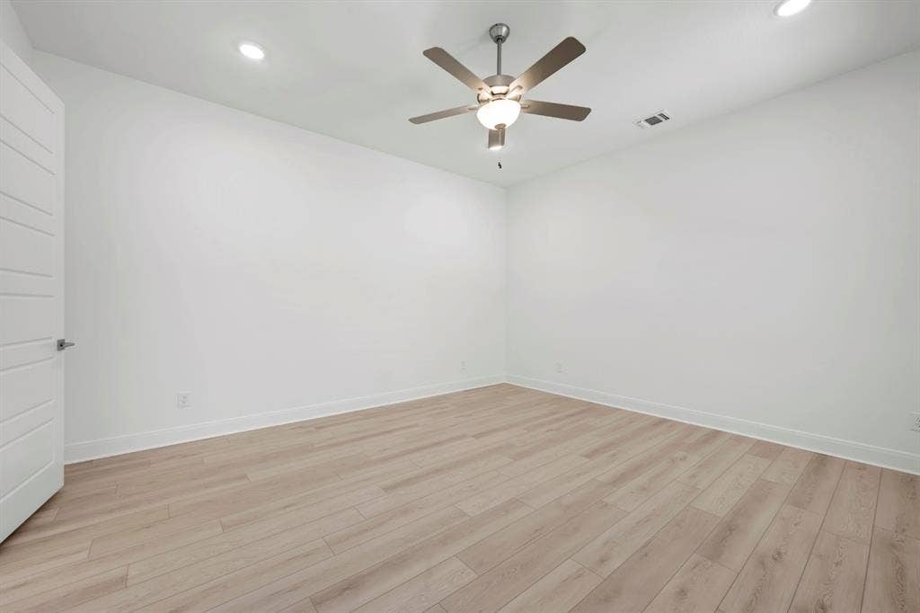 2079 Emerald Grove Lane, Arlington, TX 76005 Unfurnished room with recessed lighting, a ceiling fan, and light wood-type flooring