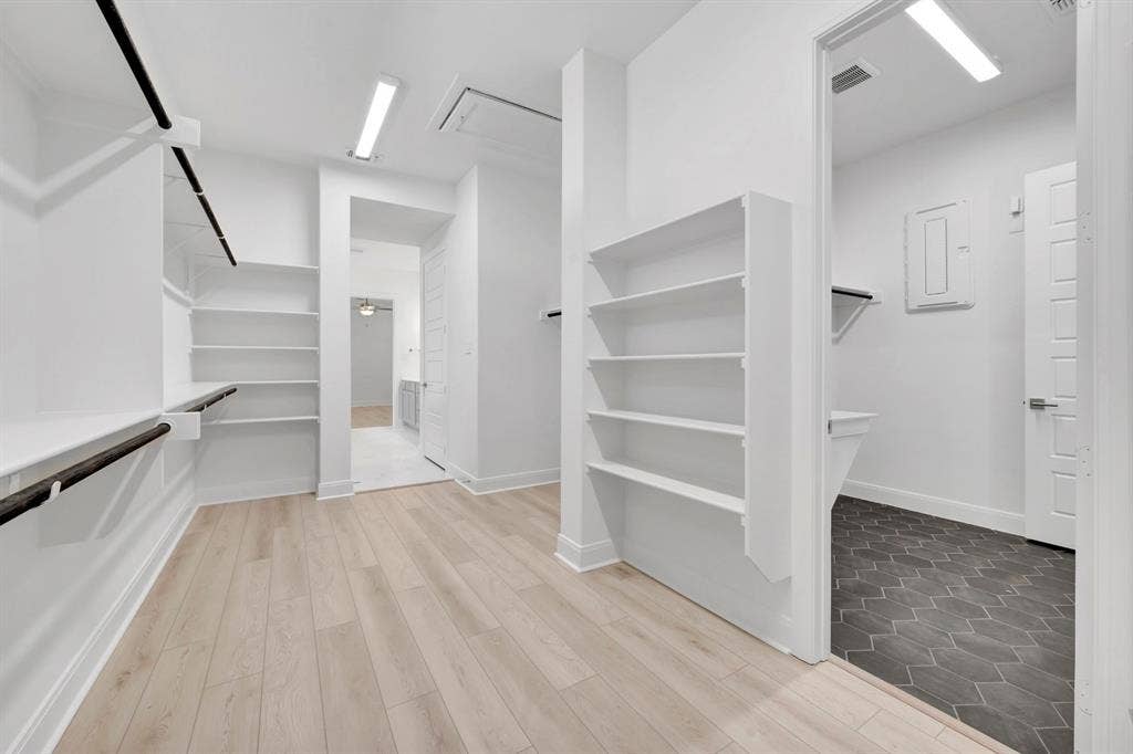 2079 Emerald Grove Lane, Arlington, TX 76005 Walk in closet with light wood-style flooring