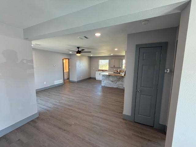 5845 Haney Drive, Watauga, TX 76148 Unfurnished living room featuring dark wood-style flooring, recessed lighting, and a ceiling fan