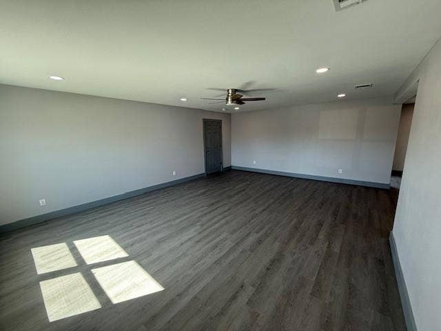 5845 Haney Drive, Watauga, TX 76148 Spare room featuring dark wood-style flooring, a ceiling fan, and recessed lighting