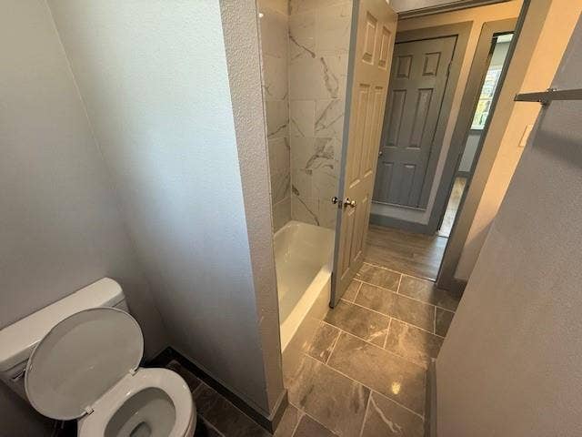 5845 Haney Drive, Watauga, TX 76148 Bathroom featuring a textured wall