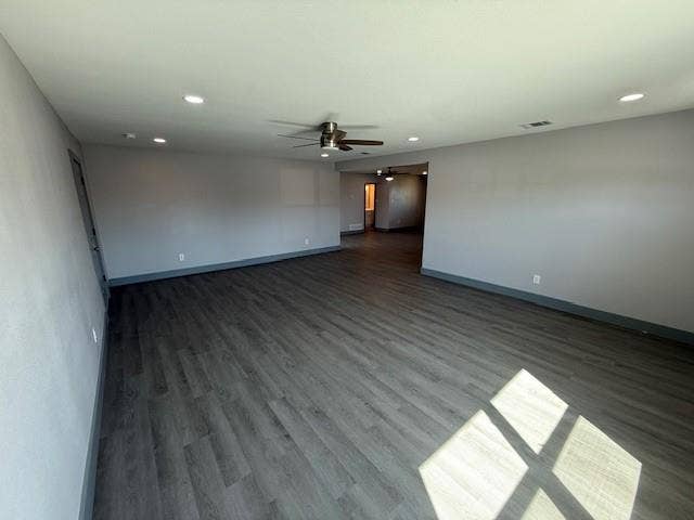 5845 Haney Drive, Watauga, TX 76148 Spare room with dark wood-style floors, a ceiling fan, and recessed lighting
