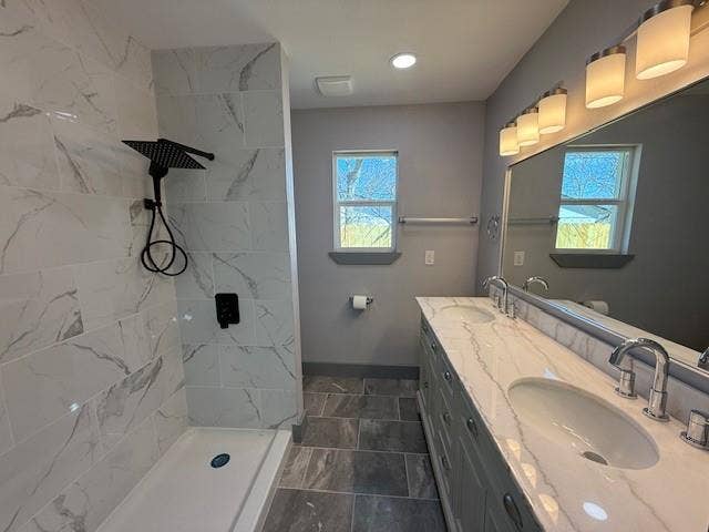 5845 Haney Drive, Watauga, TX 76148 Full bath with a tile shower, double vanity, and recessed lighting