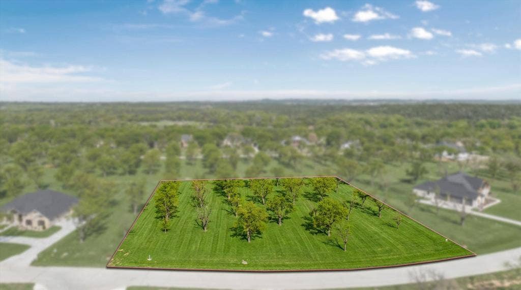 2142 E Landings N, Granbury, TX 76049 Come build your dream home!