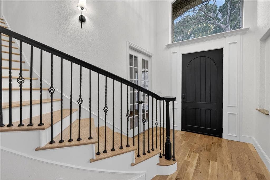 5182 Bayshore Drive, Athens, TX 75752 Entryway with wood finished floors and a high ceiling