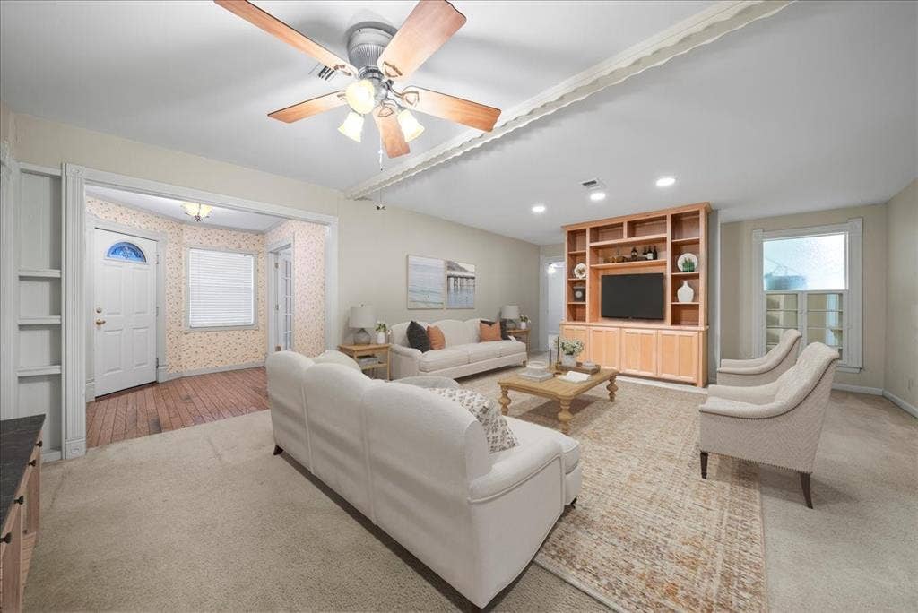 101 N 7th Street, Krum, TX 76249 Living area with a ceiling fan, light carpet, recessed lighting, and built in features