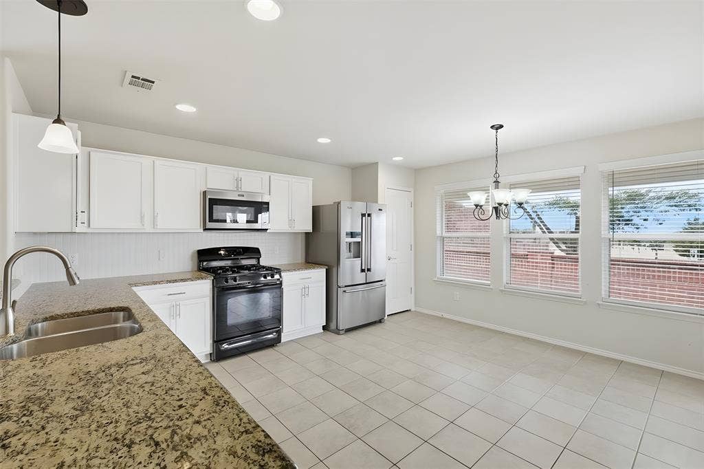 1492 Troon Drive, Frisco, TX 75036 Kitchen with Dual Sinks and Granite Counters