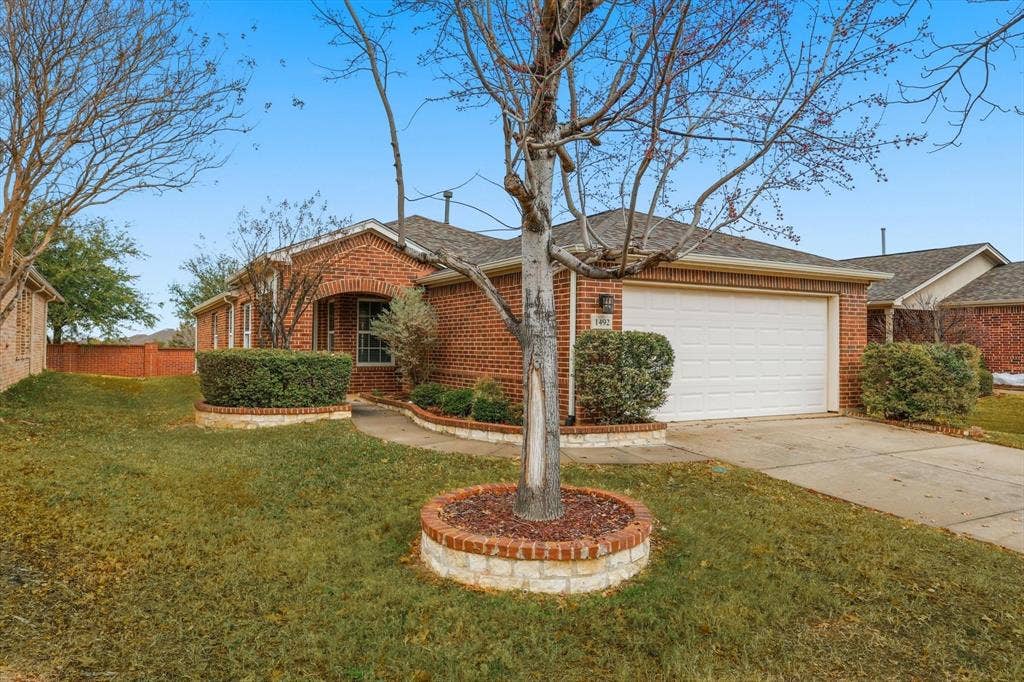 1492 Troon Drive, Frisco, TX 75036 Pine Springs model with great curb appeal