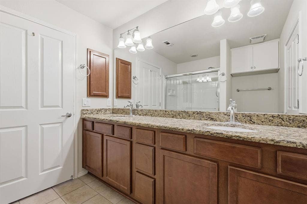 1492 Troon Drive, Frisco, TX 75036 Primary Bathroom with plenty of cabinet space