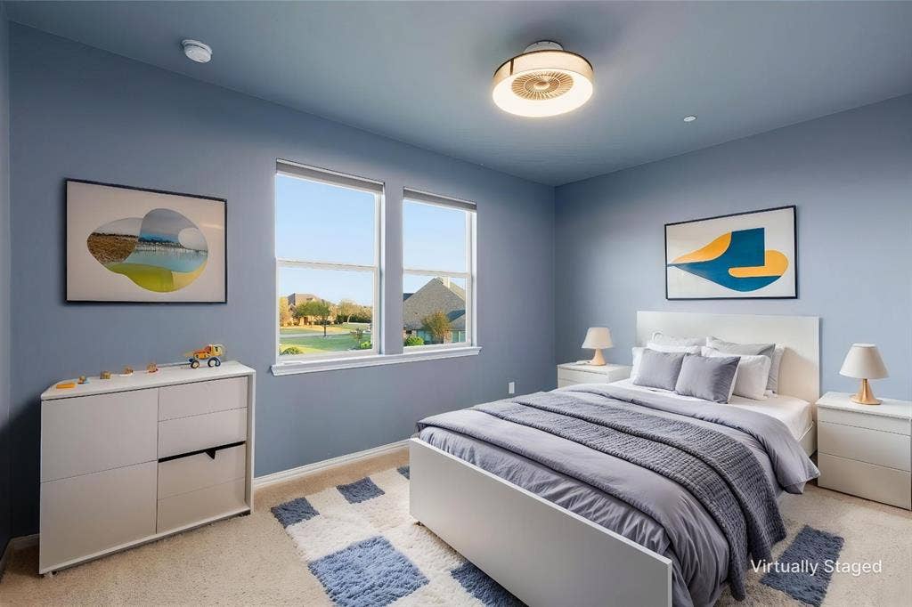 Virtually Staged Carpeted room featuring dual windows, a ceiling-mounted light fixture, and light blue wall finishes