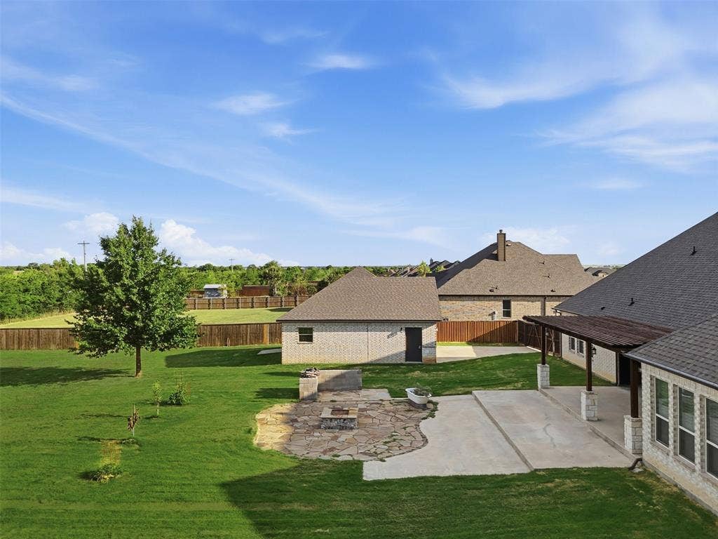 117 Vail Lane, Waxahachie, TX 75167 Backyard patio, firepit, and shop