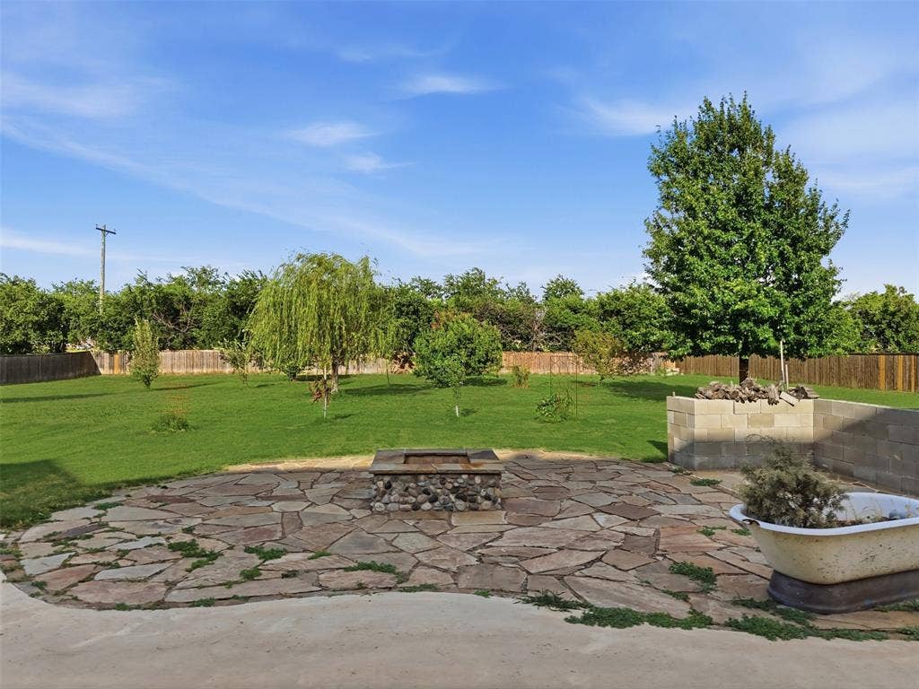 117 Vail Lane, Waxahachie, TX 75167 Firepit and grilling area on stone patio