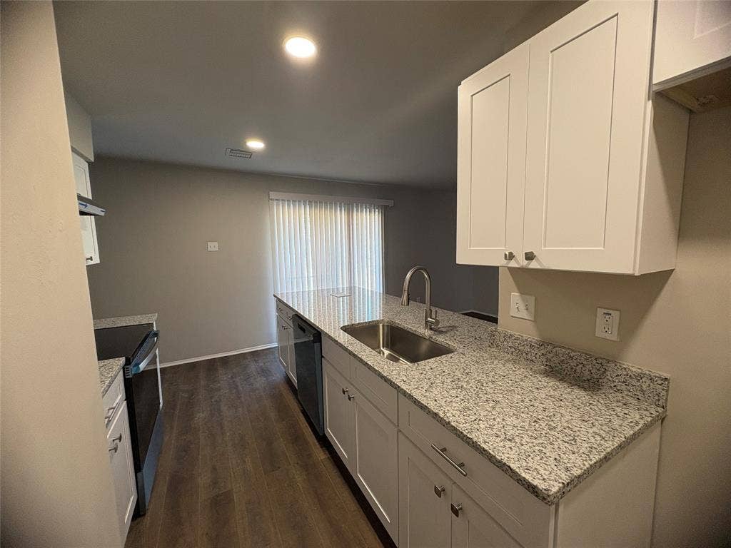 117 Yorkshire Drive, Cedar Hill, TX 75104 Kitchen with white cabinetry, a peninsula, light stone countertops, electric range, and recessed lighting