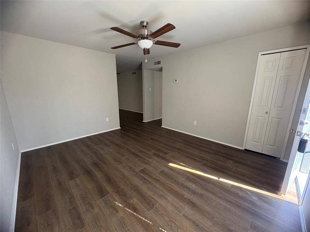 117 Yorkshire Drive, Cedar Hill, TX 75104 large living rm with dark wood-style flooring, a ceiling fan, and a closet