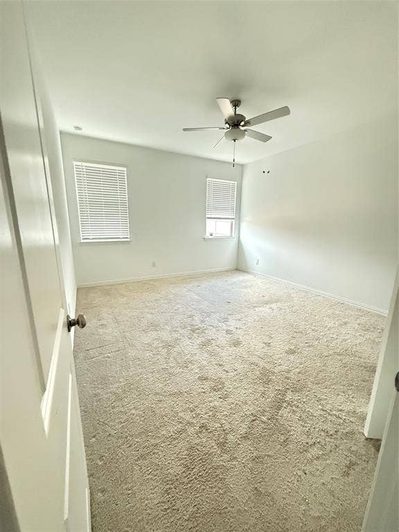 8309 Caracara Court, McKinney, TX 75071 Carpeted spare room featuring baseboards and a ceiling fan