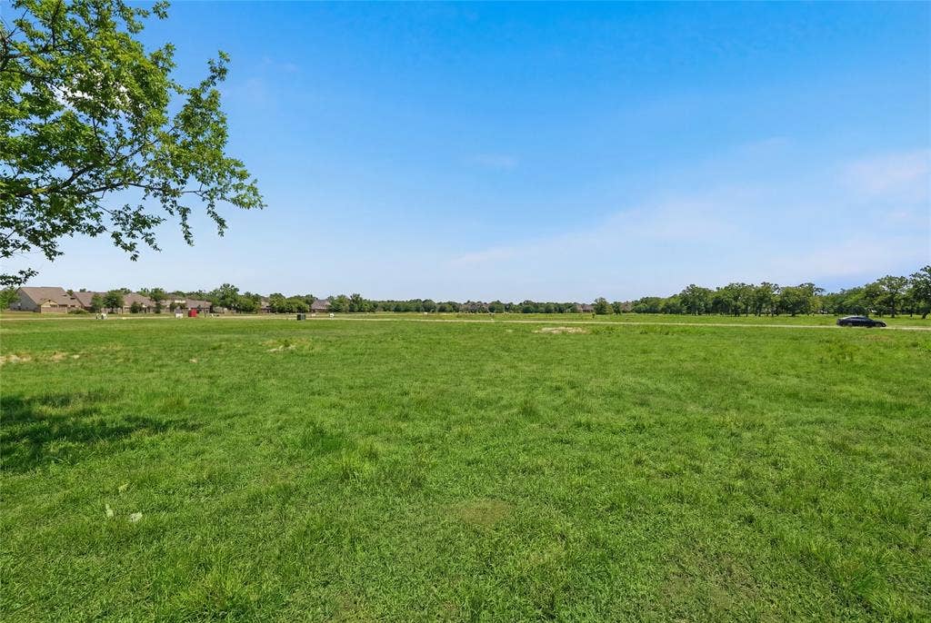 This is a photograph of Lot 2 Block G and was captured in February. It has been digitally enhanced to emphasize the presence of leaves and grass.