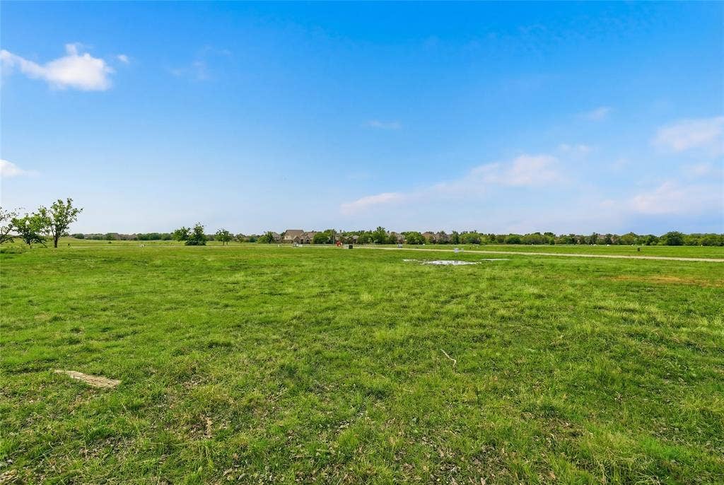 This is a photograph of Lot 2 Block G and was captured in February. It has been digitally enhanced to emphasize the presence of leaves and grass.