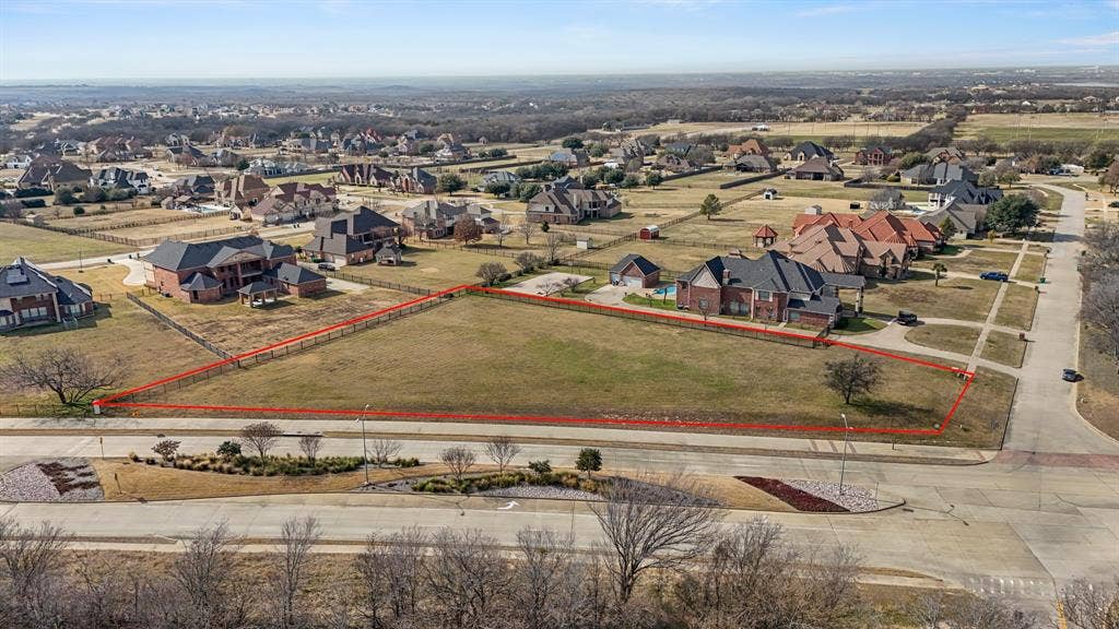 2502 Texas Plume Road, Cedar Hill, TX 75104 Aerial perspective of suburban area featuring property boundaries highlighted