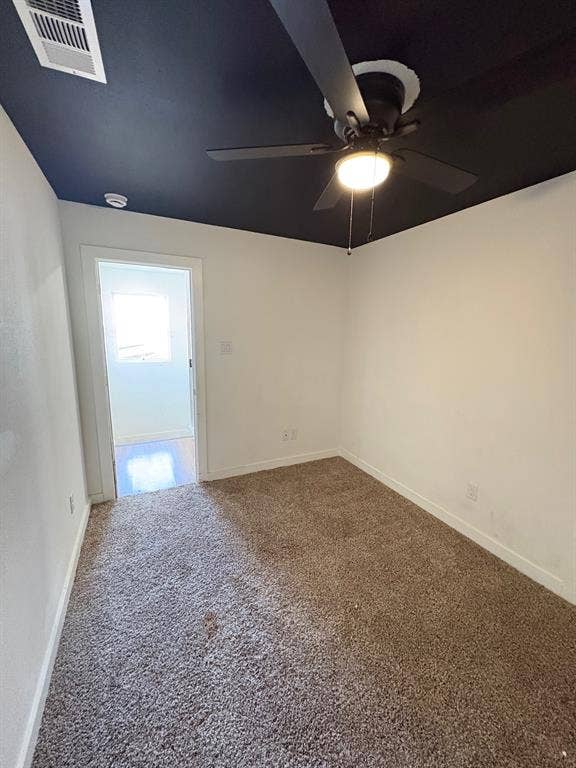4209 Metropolitan Avenue, Dallas, TX 75210 Bedroom two located upstairs. Ceiling fan.