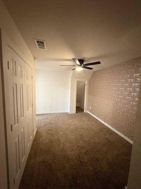 4209 Metropolitan Avenue, Dallas, TX 75210 Bedroom one with multiple closets and ceiling fan is located on 2nd floor.