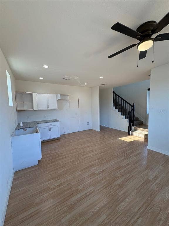 4209 Metropolitan Avenue, Dallas, TX 75210 Kitchen is open to living area and dining area. Recessed lighting.