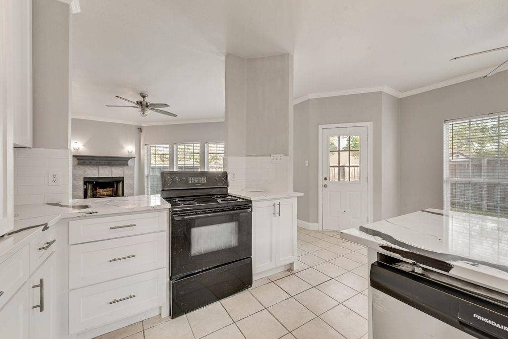 400 Buckskin Drive, Red Oak, TX 75154 Kitchen has been totally remodeled! New Quartz countertops, new Sink, New Cabinets, New paint!