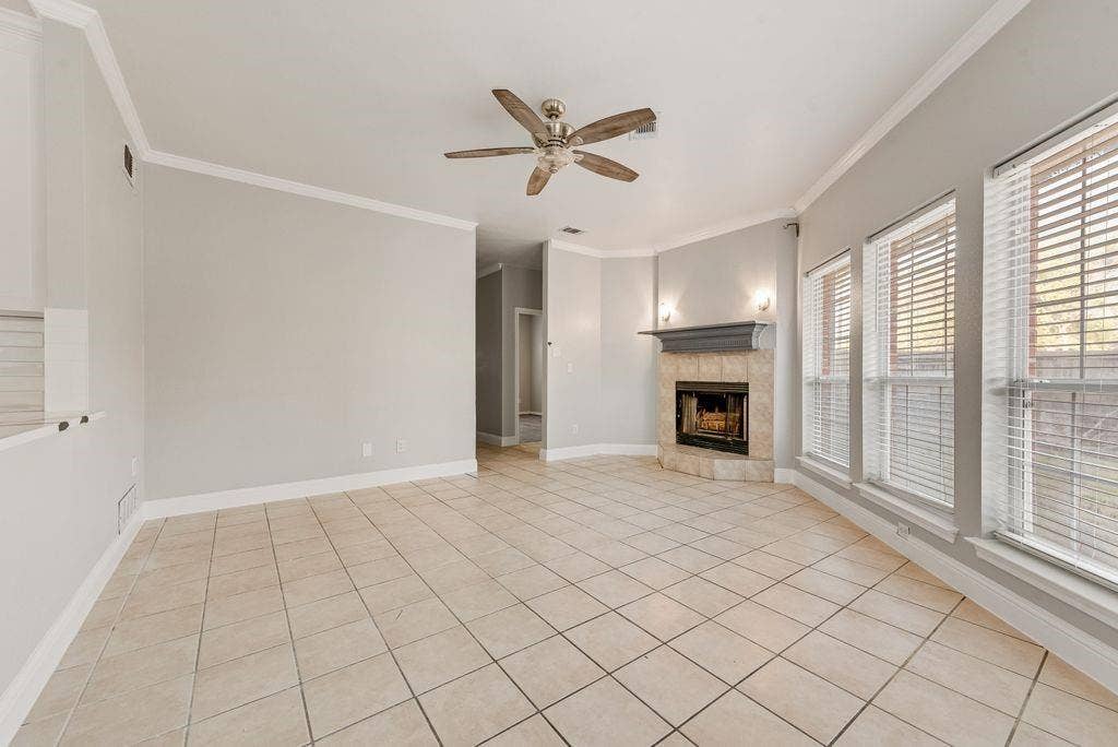 400 Buckskin Drive, Red Oak, TX 75154 Large Living Room with Tile Flooring, Fireplace, New paint and more!