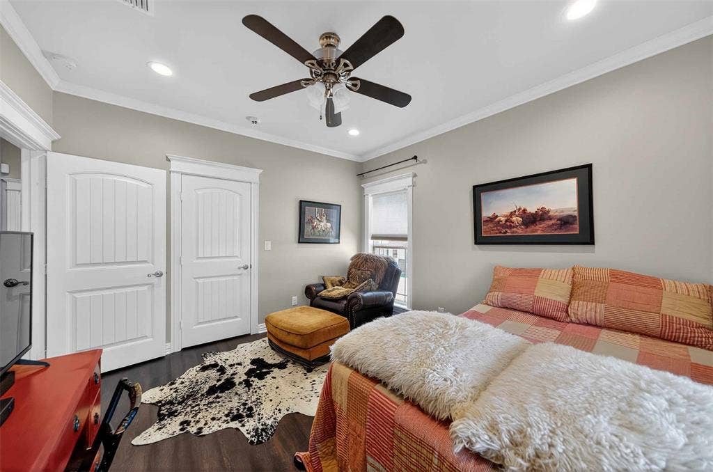23151 Champion Drive, Lindale, TX 75771 Bedroom featuring recessed lighting, ornamental molding, wood finished floors, a closet, and a ceiling fan