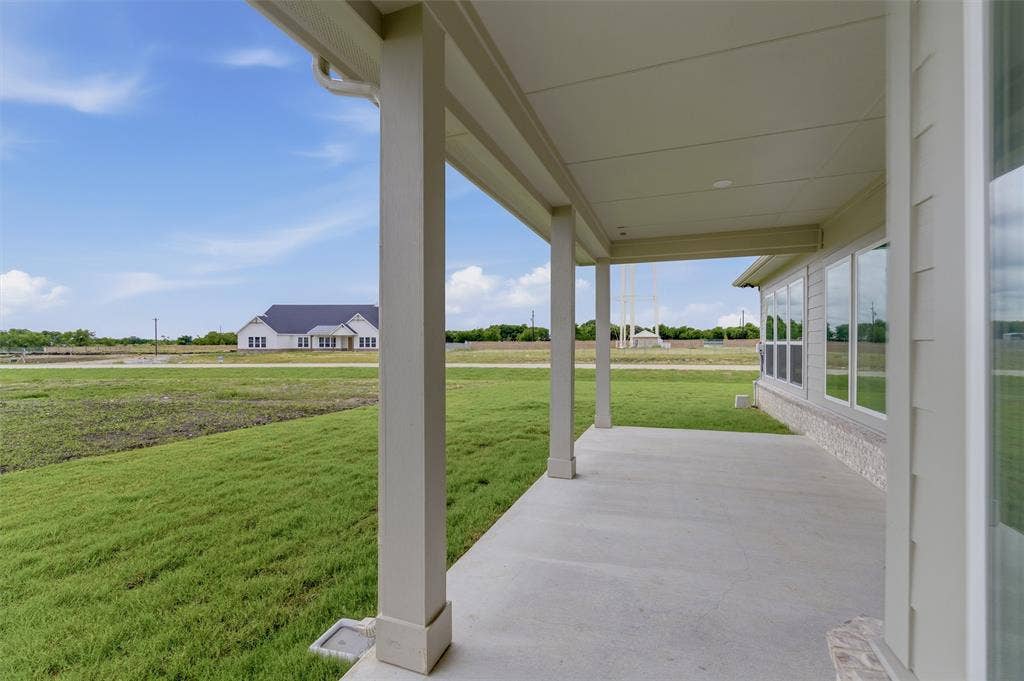 2204 Continent Court, Krum, TX 76249 Covered patio with a concrete surface and architectural columns