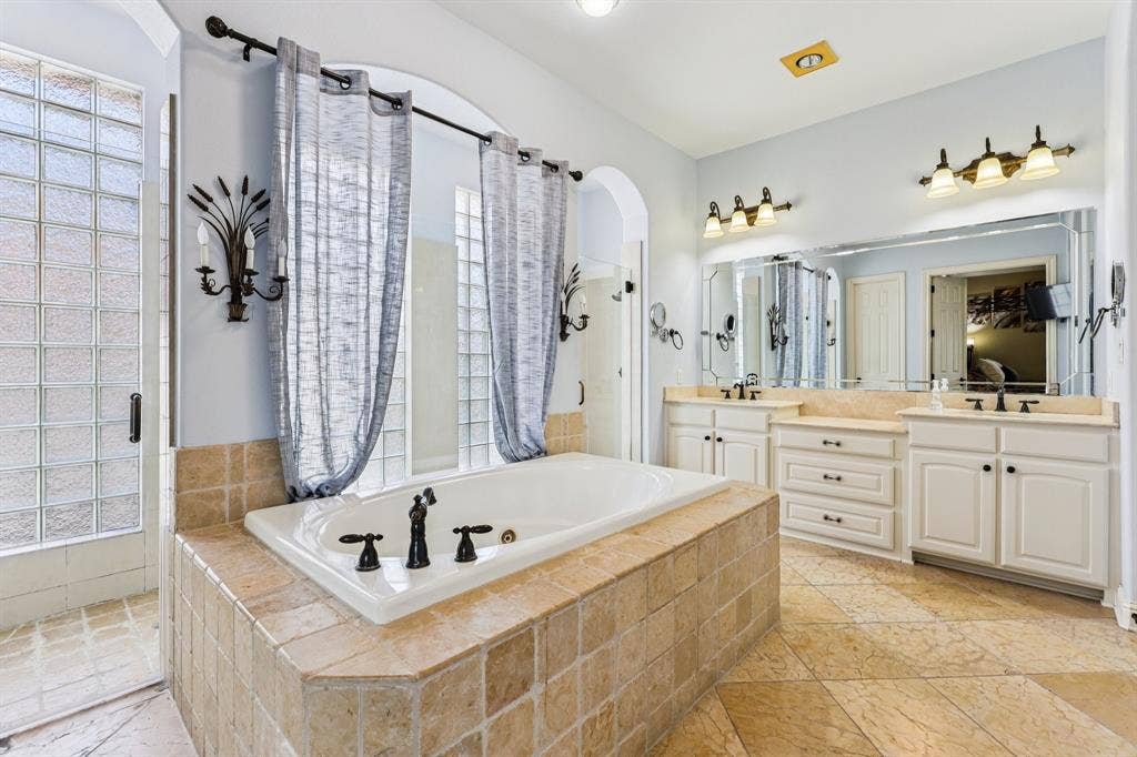 Primary Bathroom with Dual Closets