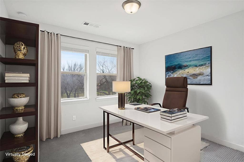 648 Courtyard Lane, Irving, TX 75039 2nd floor bedroom or office area featuring baseboards and light colored carpet