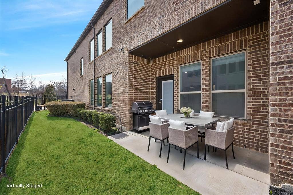 648 Courtyard Lane, Irving, TX 75039 View of patio / terrace with an outdoor kitchen / dining area