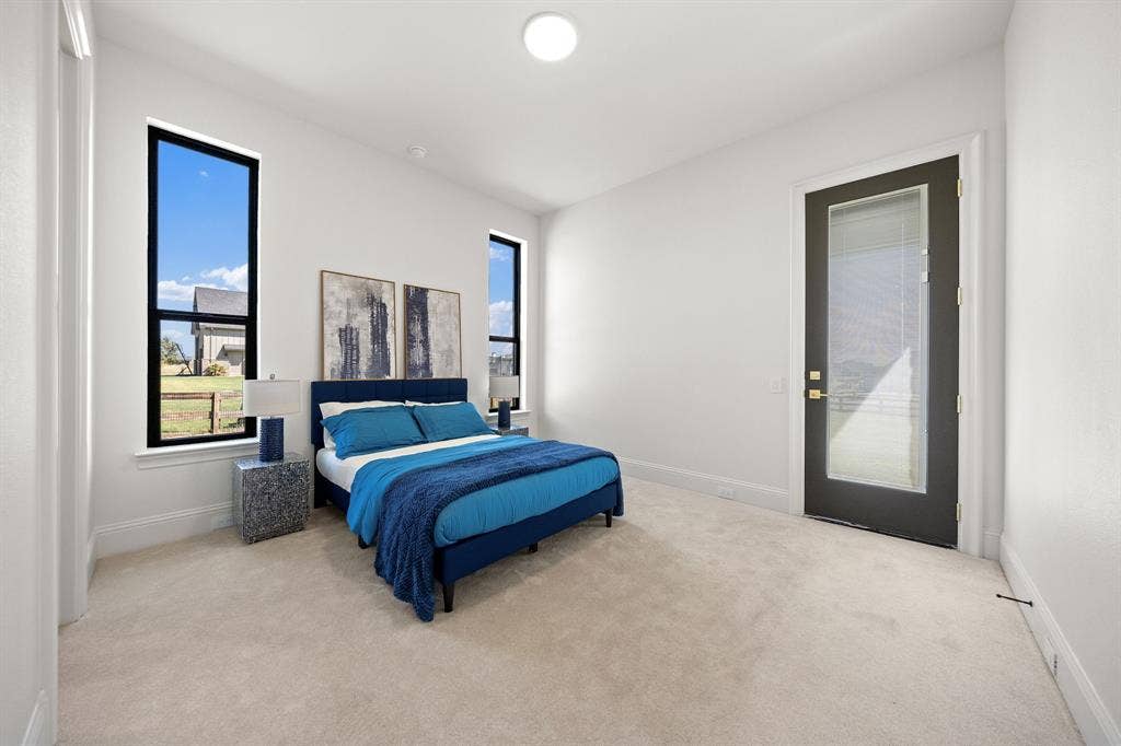 3333 Bridgegate Avenue, Northlake, TX 76247 Plush carpeted flooring, multiple vertical windows with black frames, white painted walls, and a recessed ceiling light