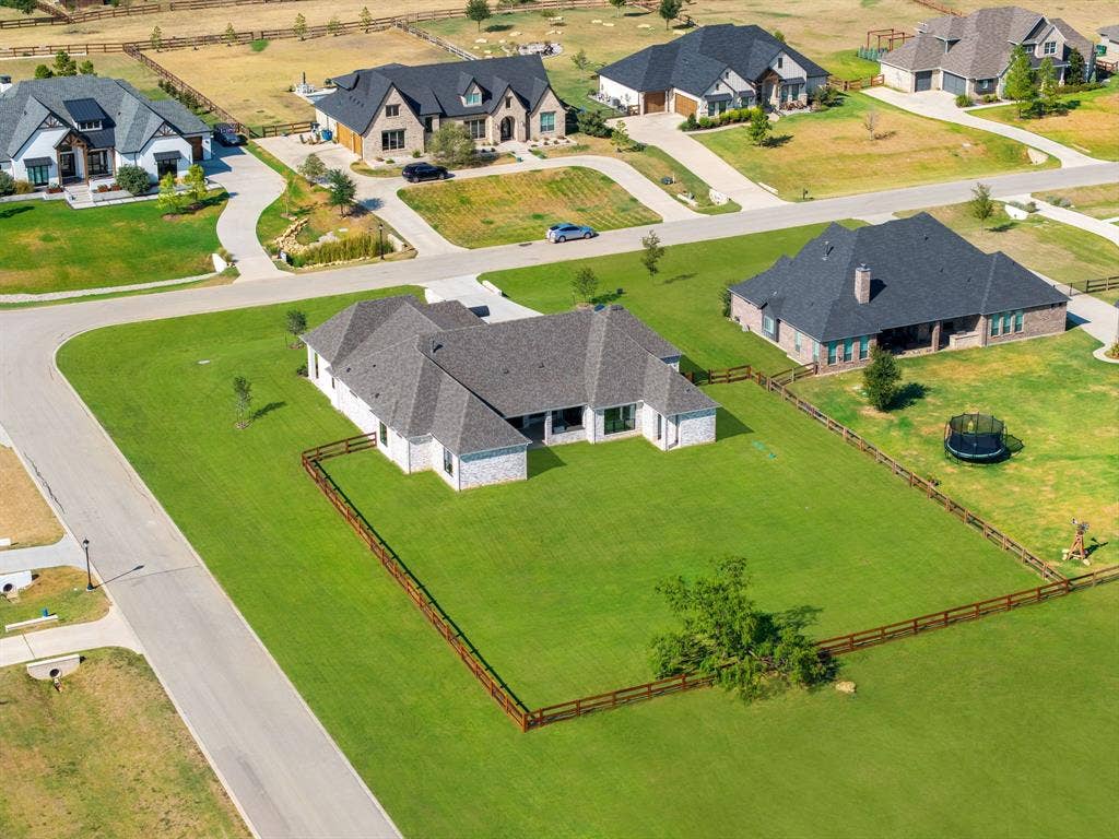 3333 Bridgegate Avenue, Northlake, TX 76247 Expansive corner lot featuring a white brick exterior and a dark shingle roof