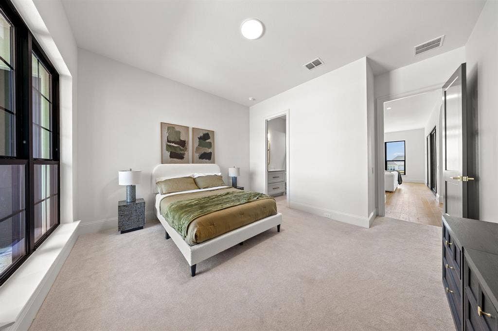 3333 Bridgegate Avenue, Northlake, TX 76247 Plush carpet flooring, a vaulted ceiling, and a large multi-pane window with black framing