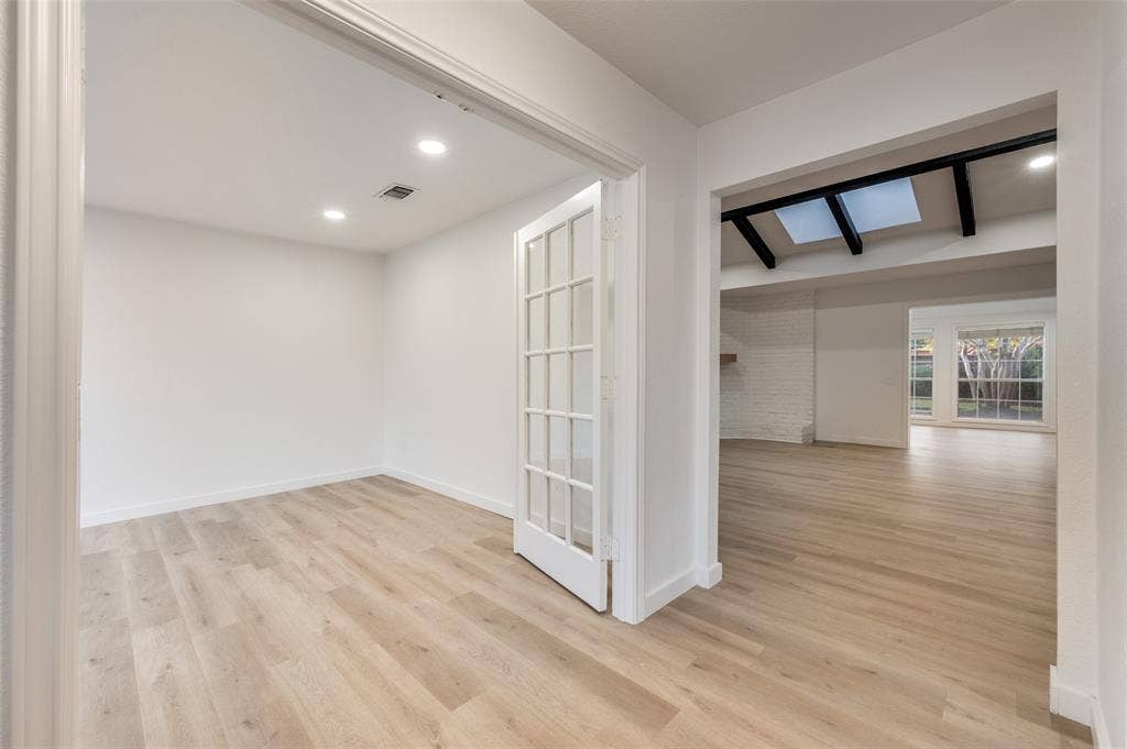 2601 Red Oak Lane, Plano, TX 75075 The private office or flex space with French doors and new recessed lighting makes an ideal space for work, study, or additional living needs.