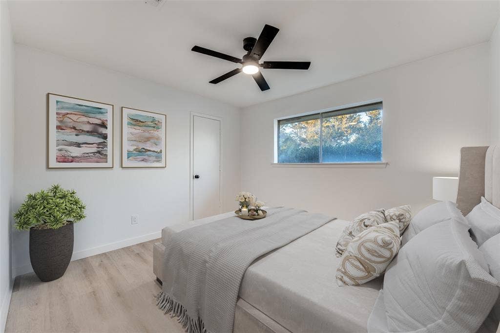 2601 Red Oak Lane, Plano, TX 75075 Smartly positioned split bedroom with walk-in closet, offering privacy for guests or flexibility for multi-generational living.