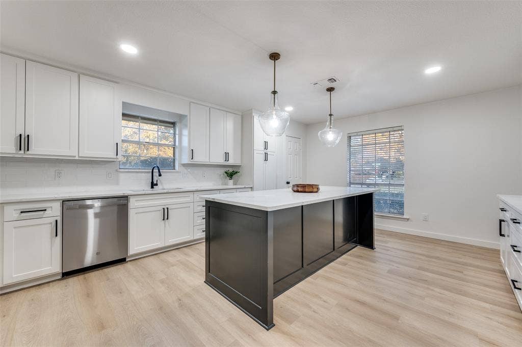 2601 Red Oak Lane, Plano, TX 75075 Stunning kitchen with designer pendant lighting.