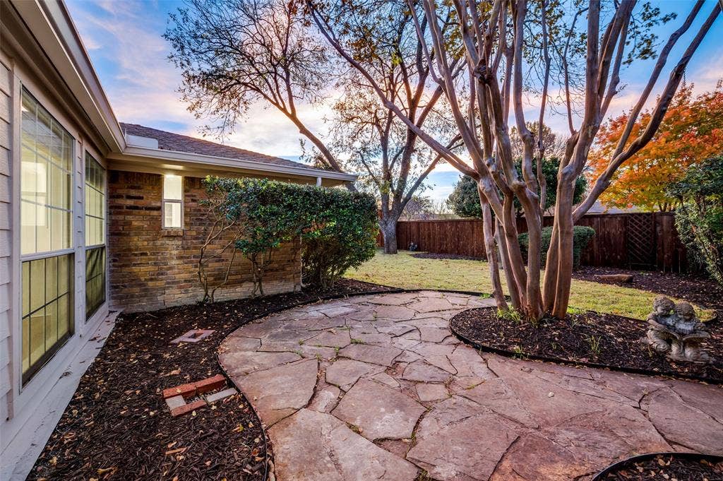 2601 Red Oak Lane, Plano, TX 75075 Low-maintenance backyard with space to relax, entertain, or play.