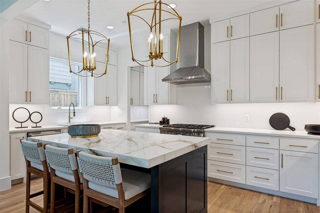 4635 Lorraine Avenue, Highland Park, TX 75209 Island with casual bar seating adds to the kitchen's functionality as well as it's aesthetic appeal
