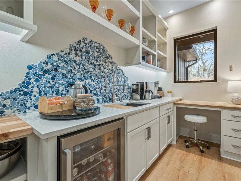 8701 Zebra Crossing, Larue, TX 75770 Desk to create menus or pay bills. Artistic flair above large sink and water fixture in pantry.