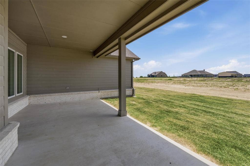 12117 Clastic Court, Krum, TX 76249 Covered patio with concrete flooring
