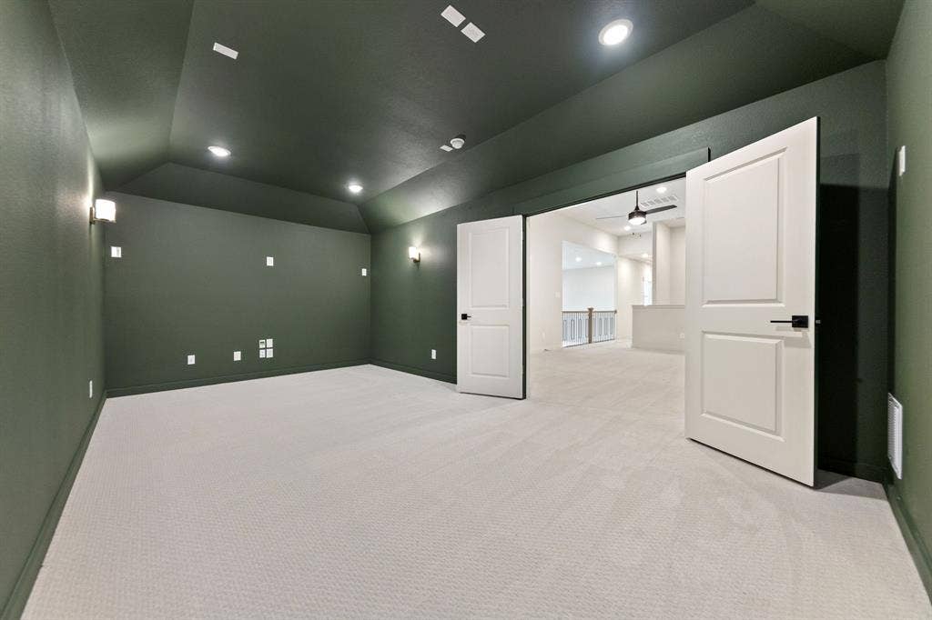 1571 Temple Court, Prosper, TX 75078 This spacious media room paired with adjacent game room create the ultimate entertainment zone!