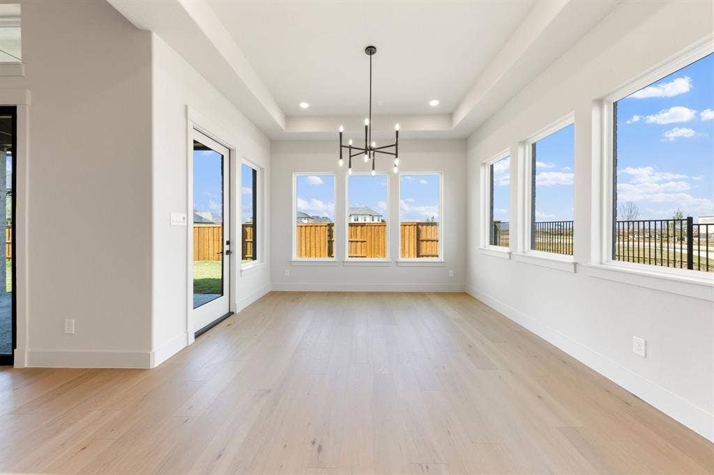 1571 Temple Court, Prosper, TX 75078 Light filled and spacious, this dining area is the perfect place for lively dinner parties or cozy family gatherings.